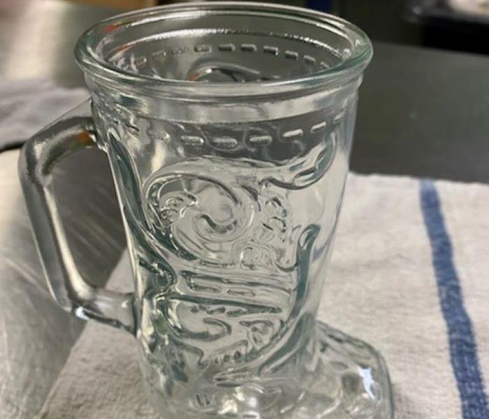 Crystal clear mug after our team cleaned it. 