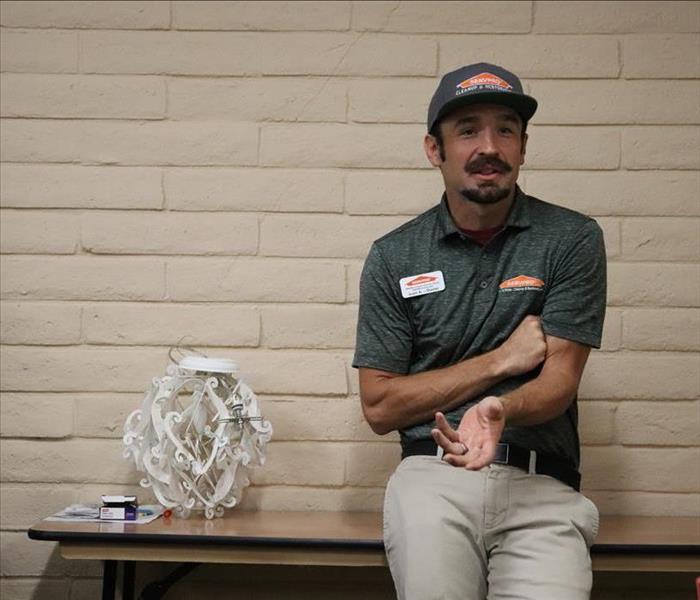 Man talking during a meeting with employees.